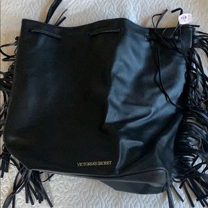 Victoria’s Secret black bag with tag still on it